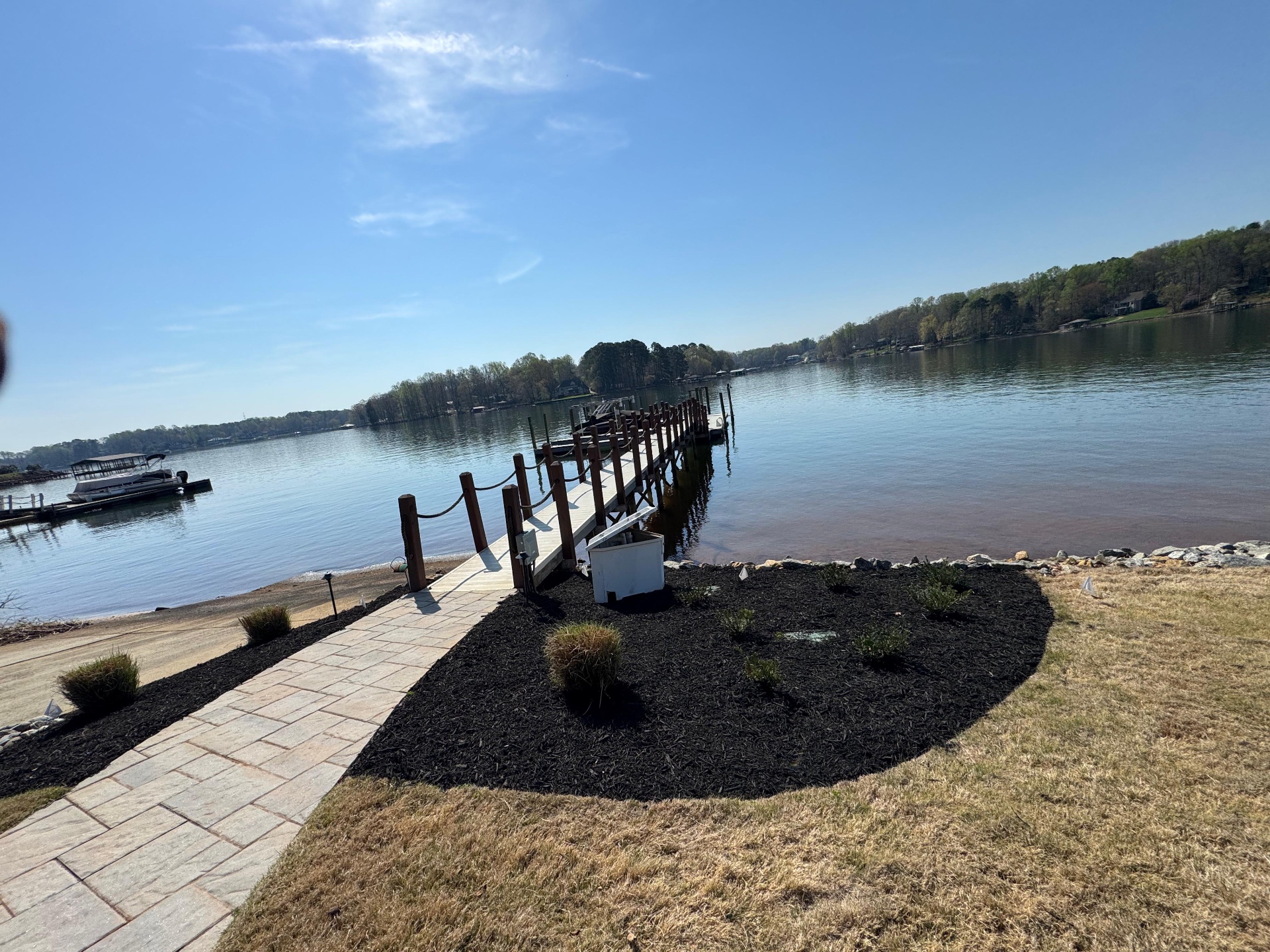 Fresh mulch and tree rings along the lakeshore